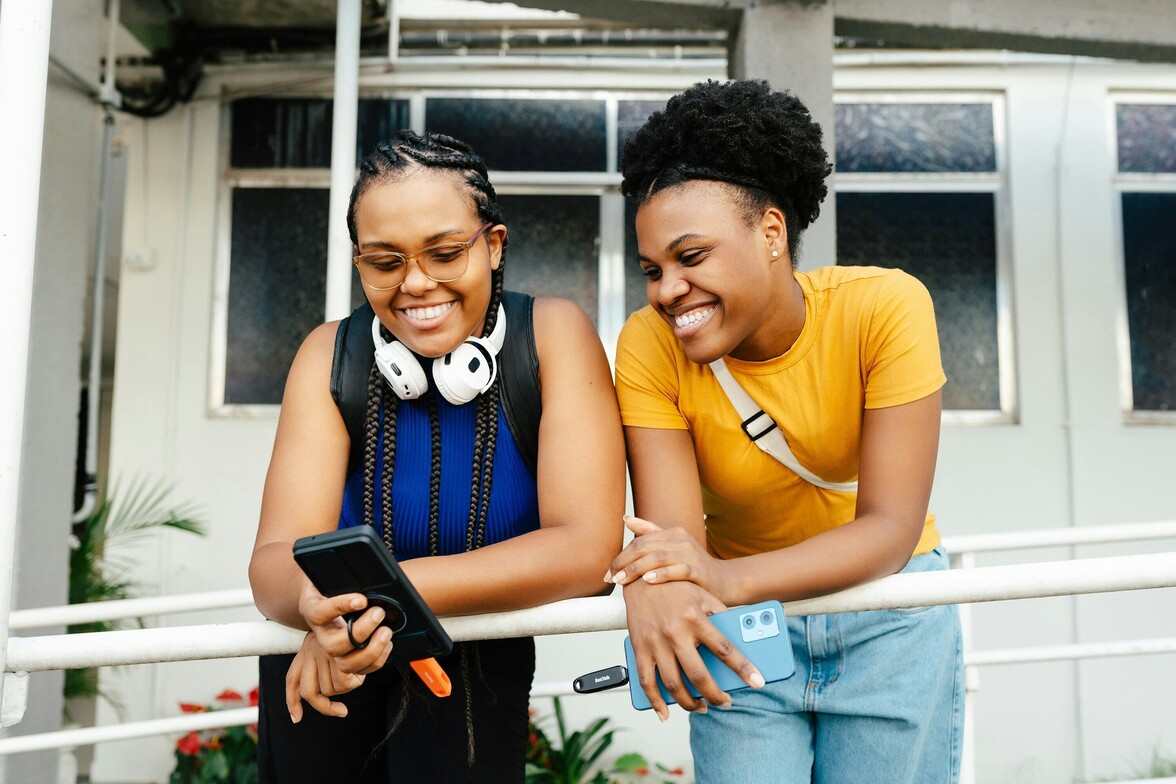 Two friends sharing a relaxed moment, reflecting connection and healthy boundaries in relationships.